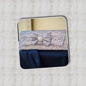 Black Lace and White Clutch w/unjust able Strap